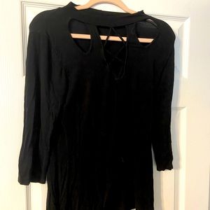 Black peep hole neck shirt.